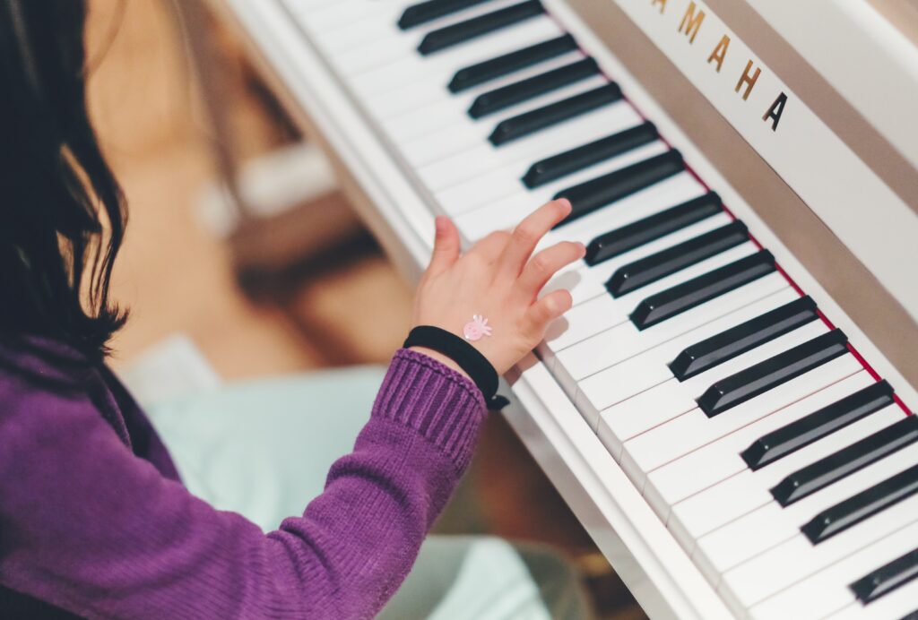 child playing piano